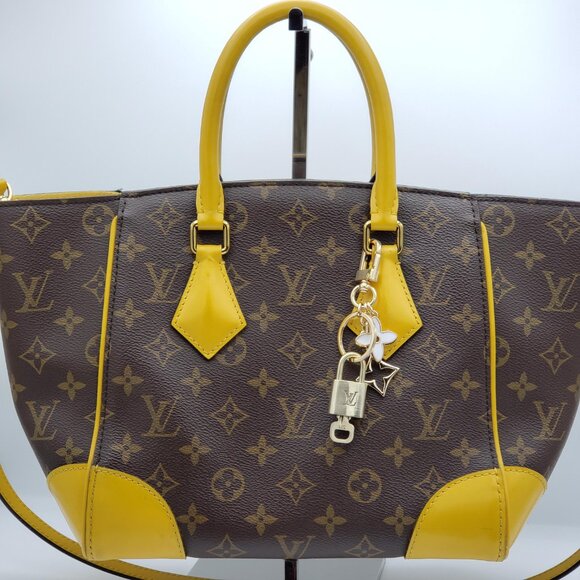 Authentic Louis Vuitton Lock & Key with Unbranded Flower  Authentic Louis Vuitton Lock & Key with Unbranded Flower Charm, Keychain